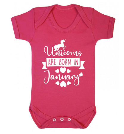 Unicorns are born in January Baby Vest dark pink 18-24 months
