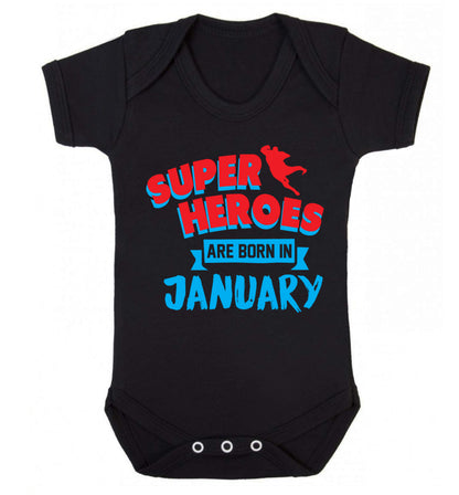 Superheros are born in January Baby Vest black 18-24 months