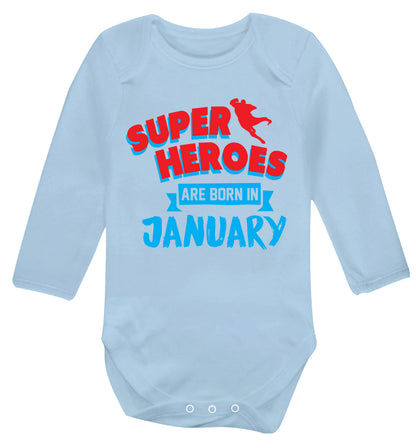 Superheros are born in January Baby Vest long sleeved pale blue 6-12 months