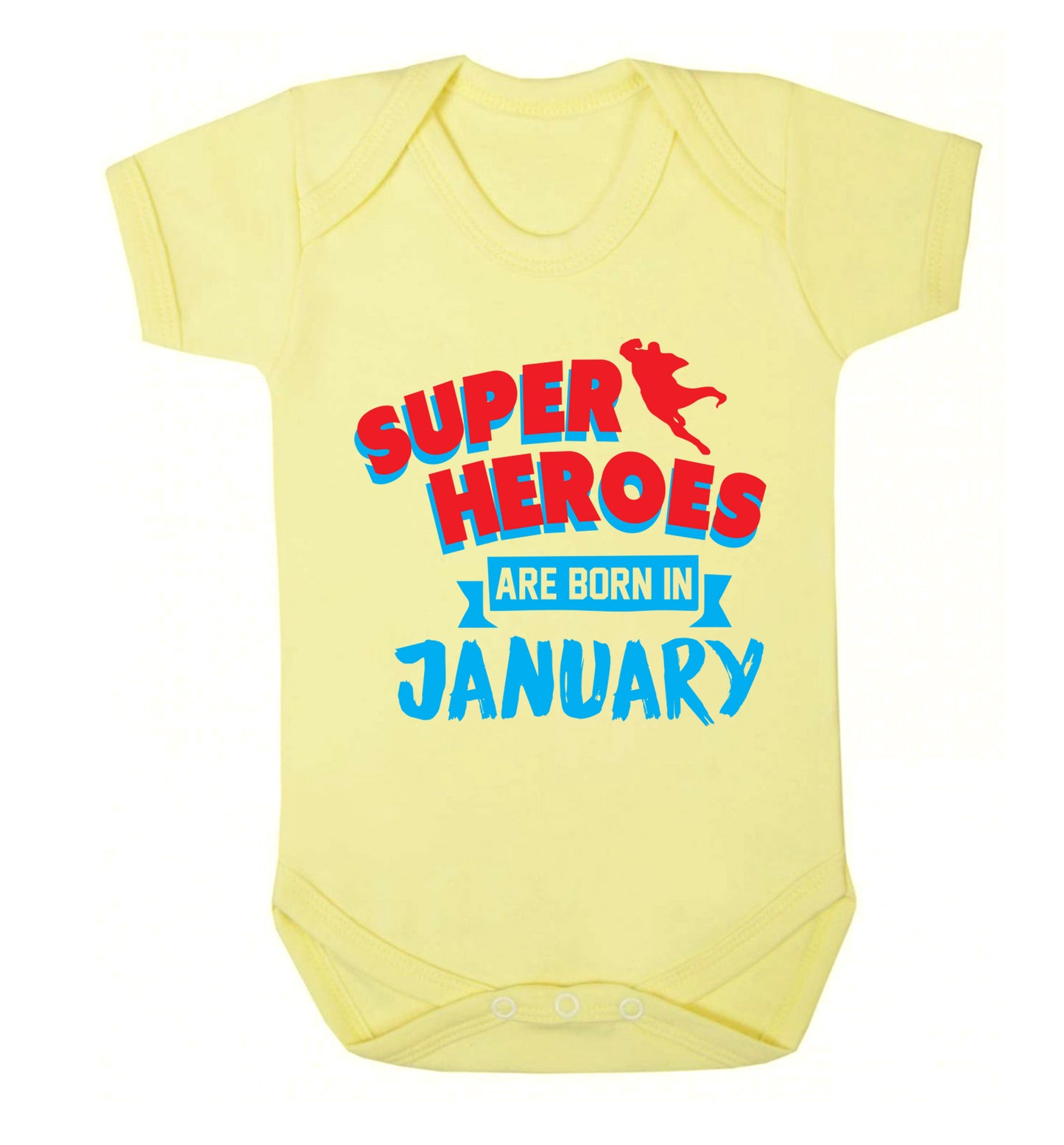 Superheros are born in January Baby Vest pale yellow 18-24 months