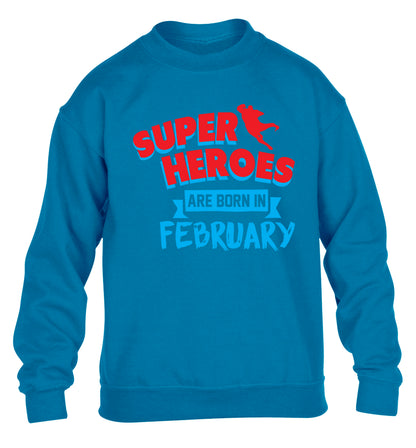 superheroes are born in February children's blue sweater 12-13 Years