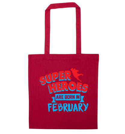 superheroes are born in February red tote bag