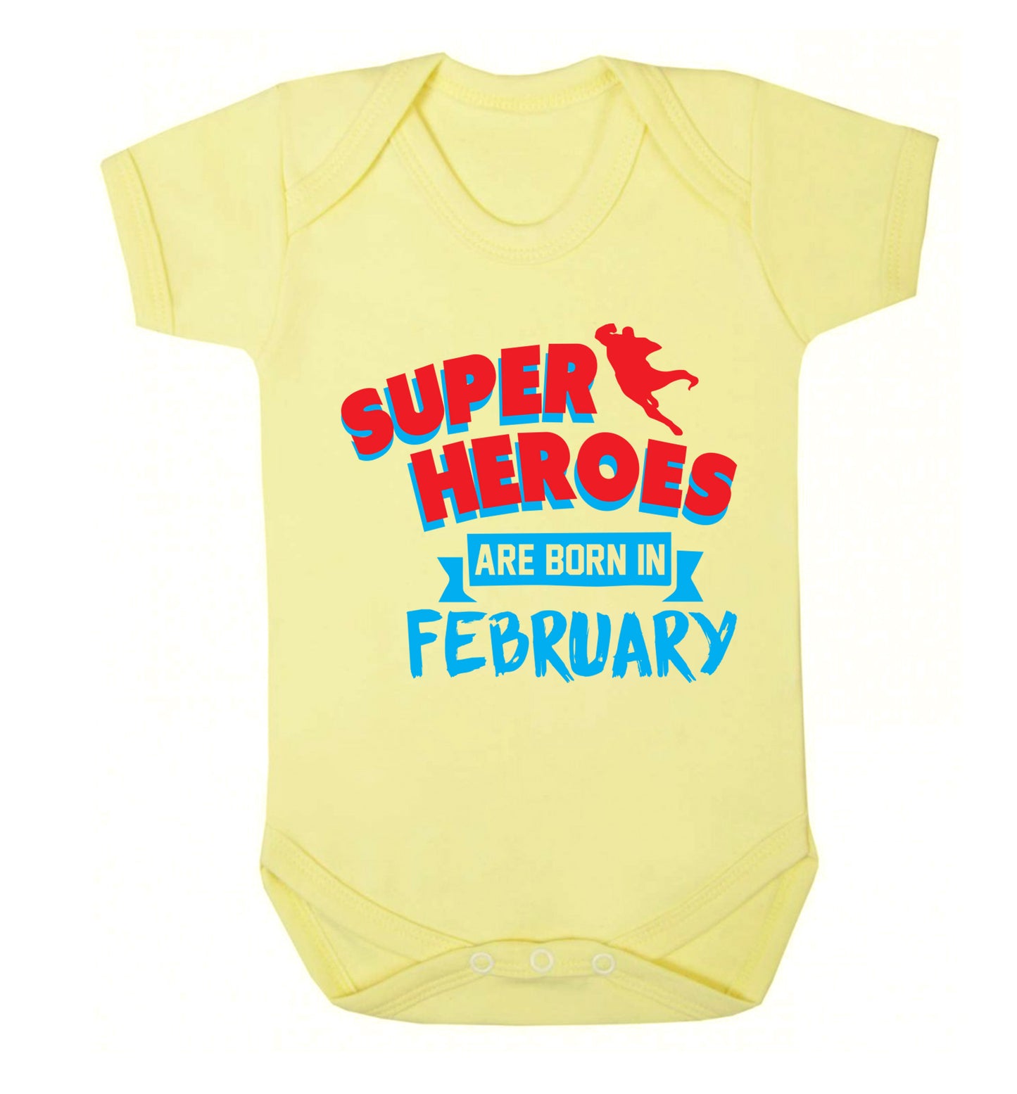 superheroes are born in February Baby Vest pale yellow 18-24 months