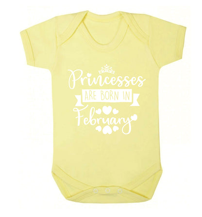 Princesses are born in February Baby Vest pale yellow 18-24 months
