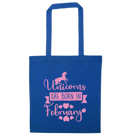 Unicorns are born in February blue tote bag