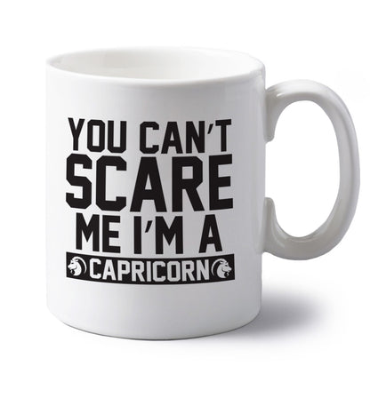 You can't scare me I'm a capricorn left handed white ceramic mug 