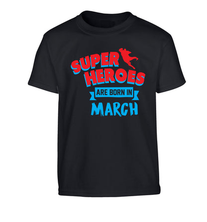 Superheros are born in March Children's black Tshirt 12-13 Years