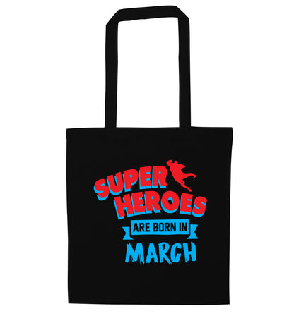Superheros are born in March black tote bag