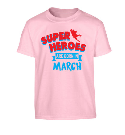 Superheros are born in March Children's light pink Tshirt 12-13 Years