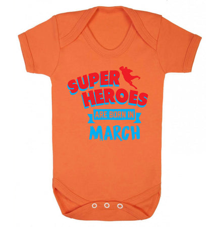 Superheros are born in March Baby Vest orange 18-24 months