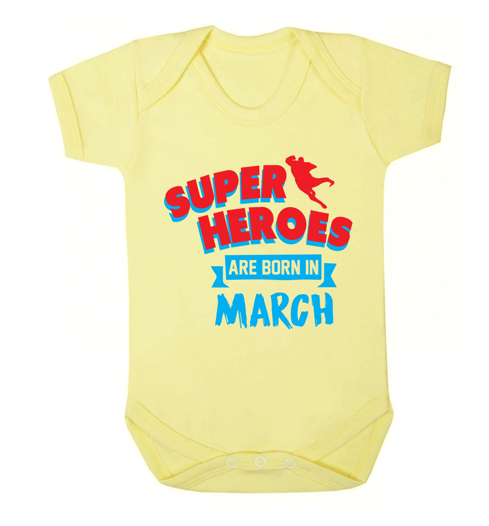 Superheros are born in March Baby Vest pale yellow 18-24 months