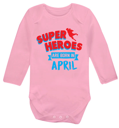 Superheros are born in April Baby Vest long sleeved pale pink 6-12 months