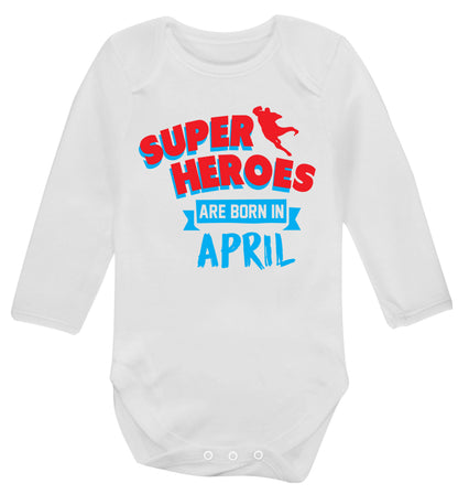 Superheros are born in April Baby Vest long sleeved white 6-12 months