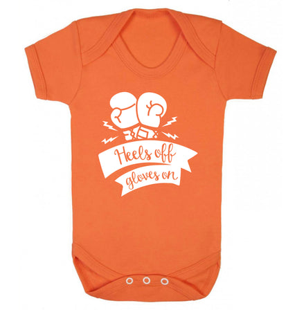 Heels off gloves on Baby Vest orange 18-24 months