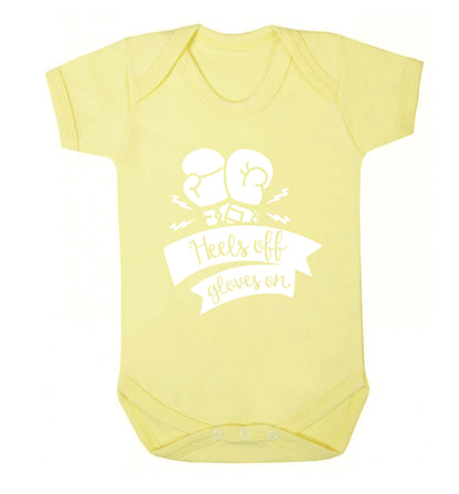 Heels off gloves on Baby Vest pale yellow 18-24 months