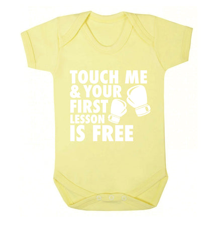 Touch me and your First Lesson is Free  Baby Vest pale yellow 18-24 months