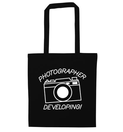 Photographer Developing  black tote bag