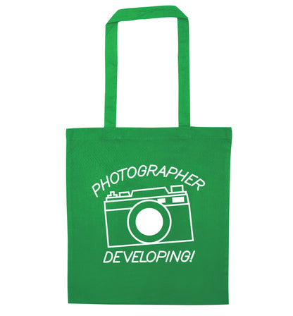 Photographer Developing  green tote bag