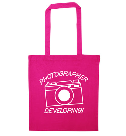 Photographer Developing  pink tote bag