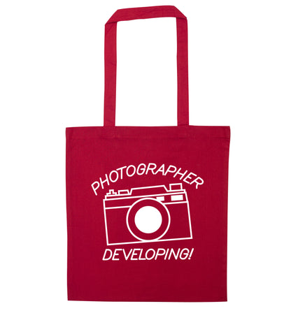 Photographer Developing  red tote bag