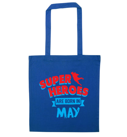 Superheros are born in May blue tote bag