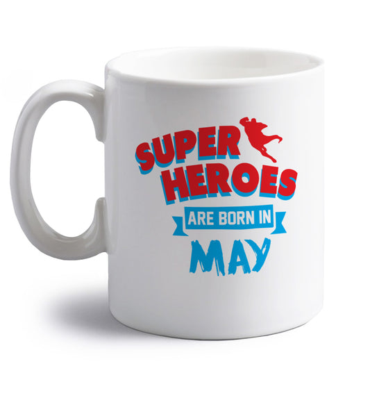 Superheros are born in May right handed white ceramic mug 