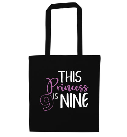 This princess is nine black tote bag