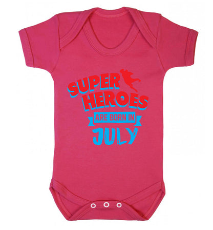 Superheroes are born in July Baby Vest dark pink 18-24 months