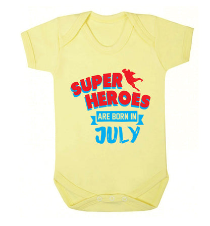 Superheroes are born in July Baby Vest pale yellow 18-24 months