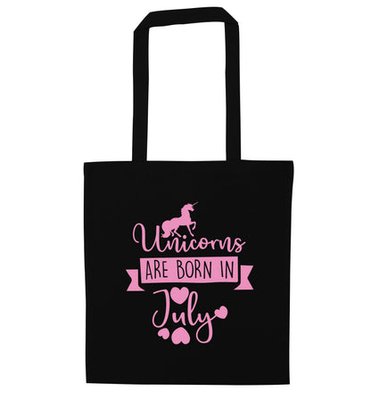 Unicorns are born in July black tote bag