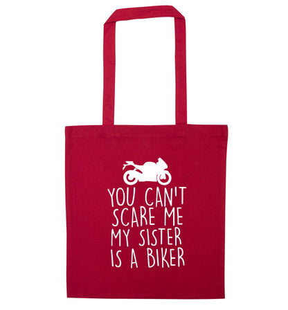 You can't scare me my sister is a biker red tote bag