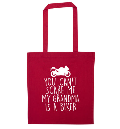 You can't scare me my grandma is a biker red tote bag