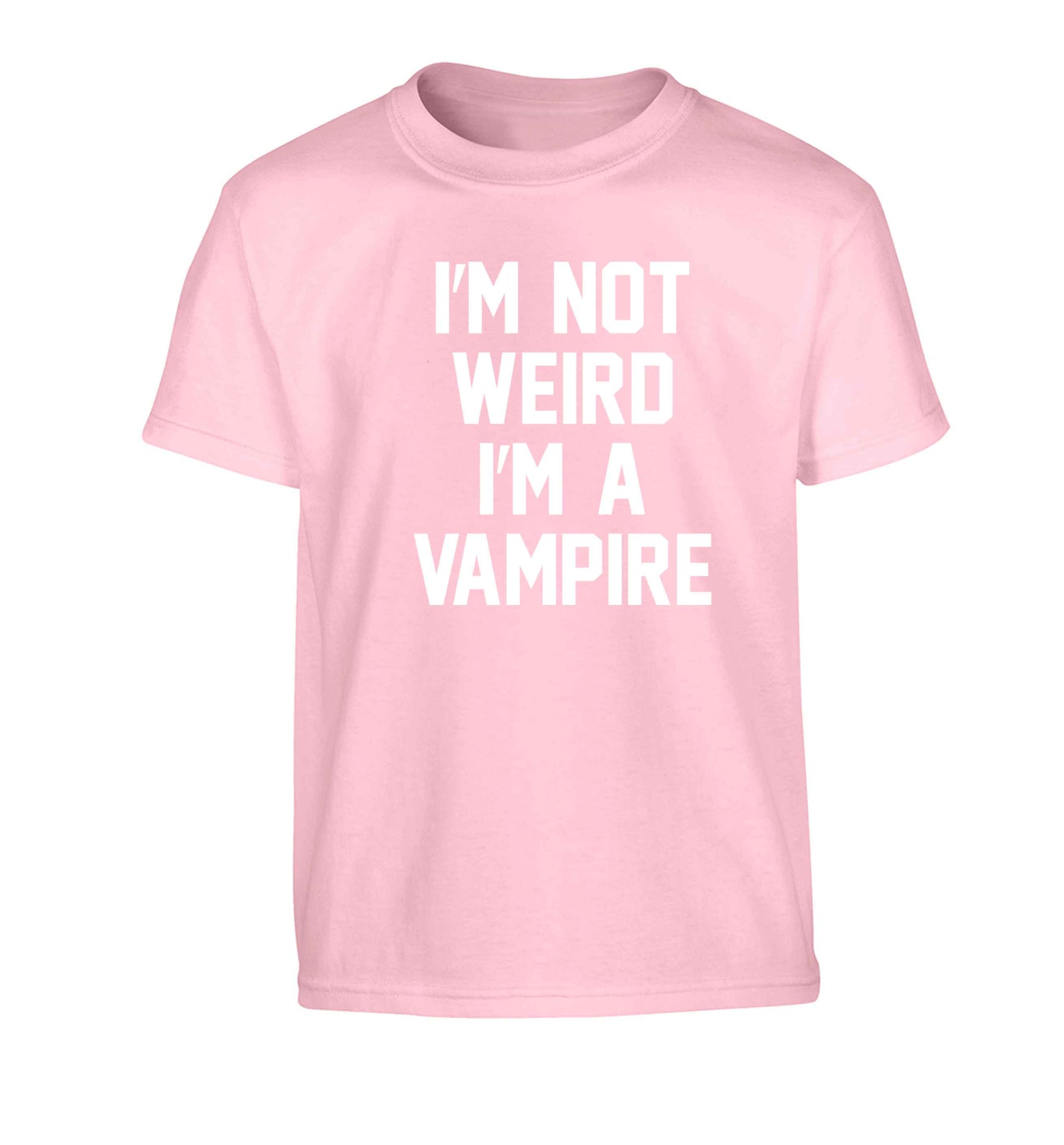I'm not weird I'm a vampire Children's light pink Tshirt 12-13 Years