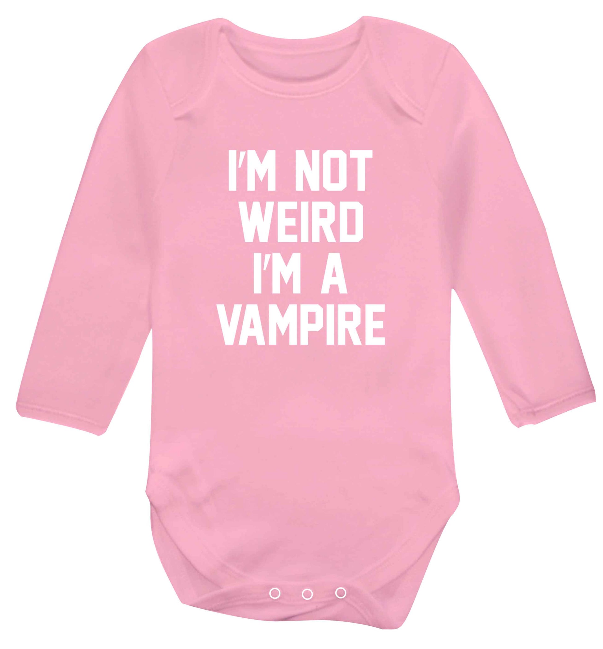 I'm not weird I'm a vampire baby vest long sleeved pale pink 6-12 months