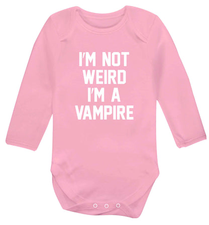 I'm not weird I'm a vampire baby vest long sleeved pale pink 6-12 months