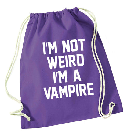 I'm not weird I'm a vampire purple drawstring bag