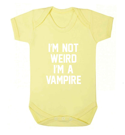 I'm not weird I'm a vampire baby vest pale yellow 18-24 months