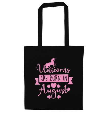 Unicorns are born in August black tote bag