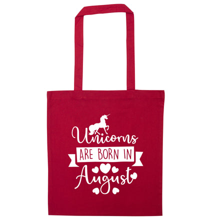 Unicorns are born in August red tote bag