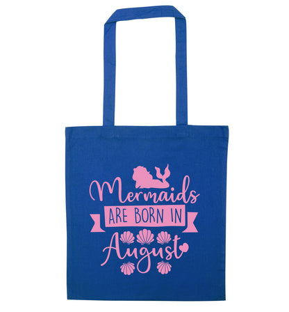 Mermaids are born in August blue tote bag