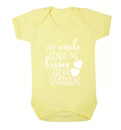 My uncle sends me kisses from overseas Baby Vest pale yellow 18-24 months