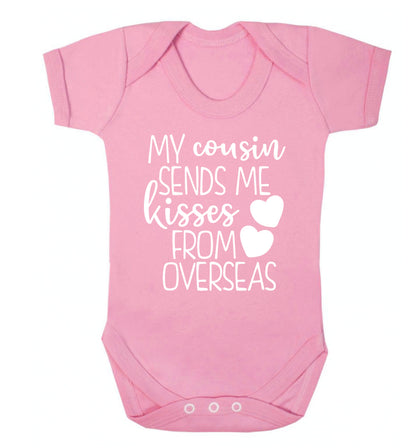 My cousin sends me kisses from overseas Baby Vest pale pink 18-24 months