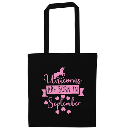 Unicorns are born in September black tote bag