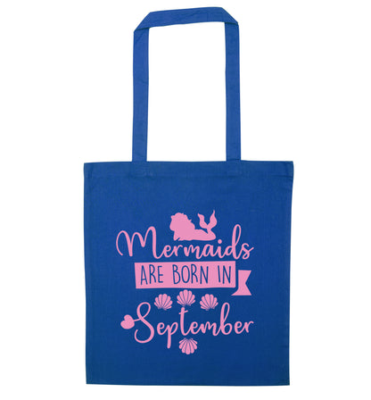 Mermaids are born in September blue tote bag