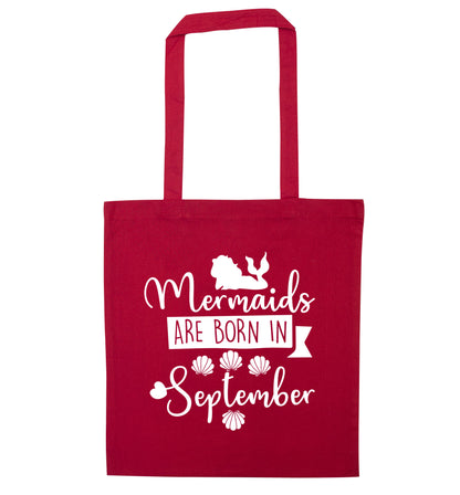 Mermaids are born in September red tote bag