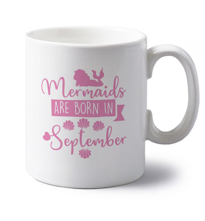 Mermaids are born in September left handed white ceramic mug 