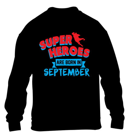 Superheroes are born in September children's black sweater 12-13 Years
