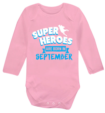 Superheroes are born in September Baby Vest long sleeved pale pink 6-12 months