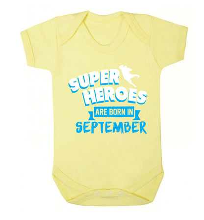 Superheroes are born in September Baby Vest pale yellow 18-24 months