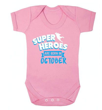 Superheroes are born in October Baby Vest pale pink 18-24 months